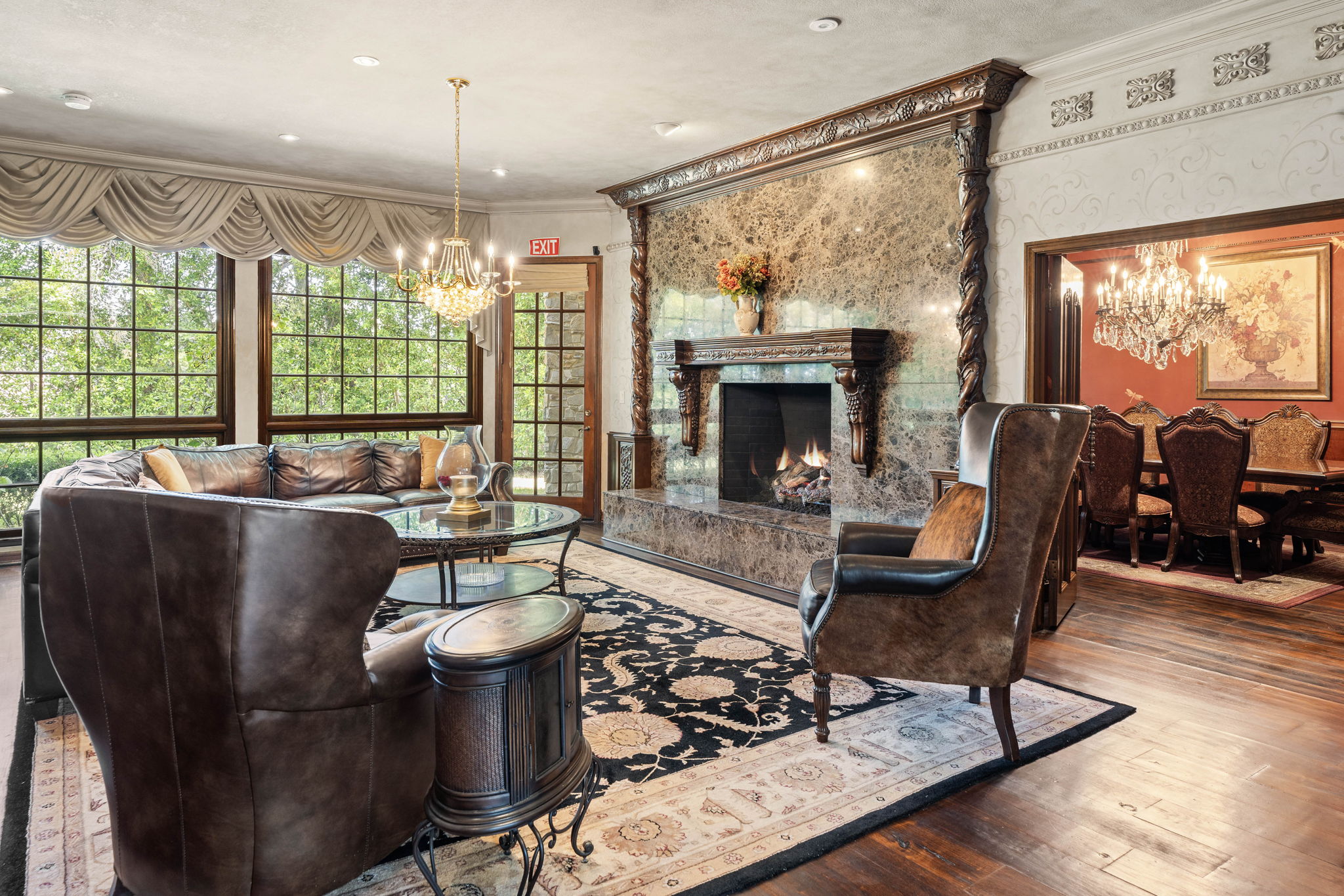 Formal living room with fireplace and elegant furnishings