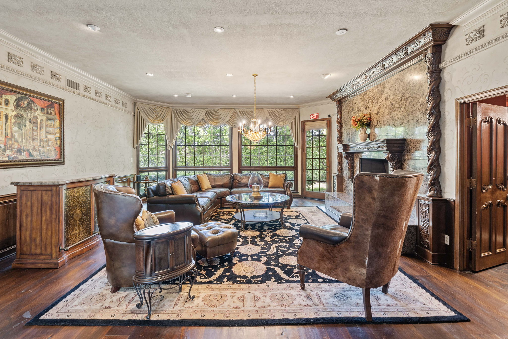 Living room with leather seating and classic decor