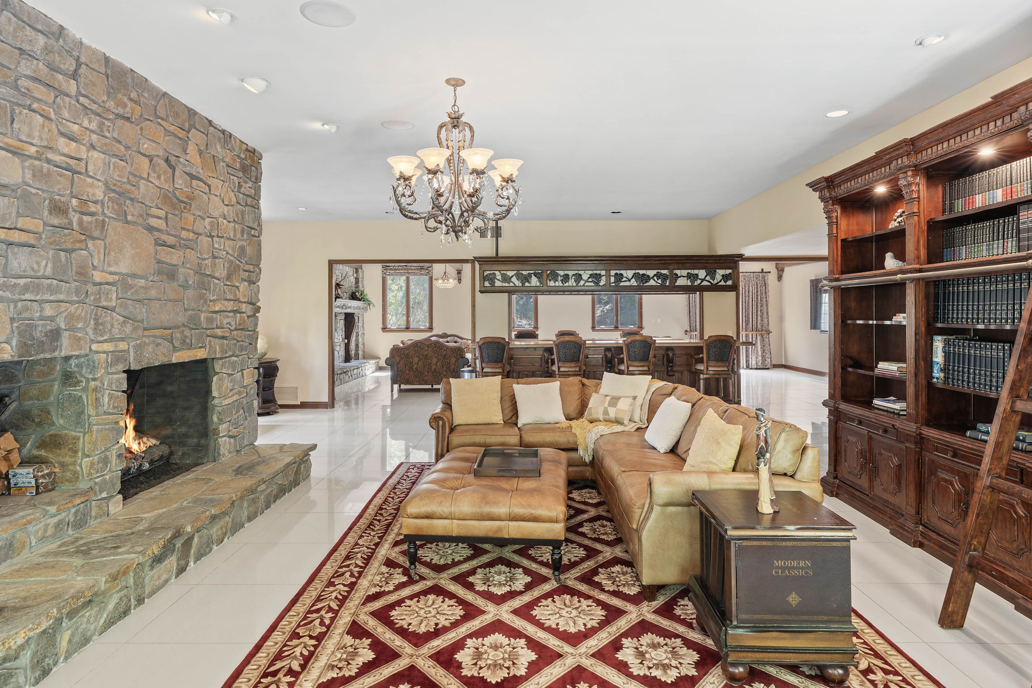 Great room with built-in library shelving and fireplace
