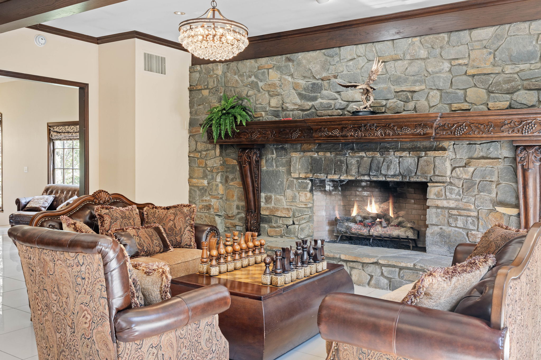 Lounge with chess table and fireplace for quiet recreation
