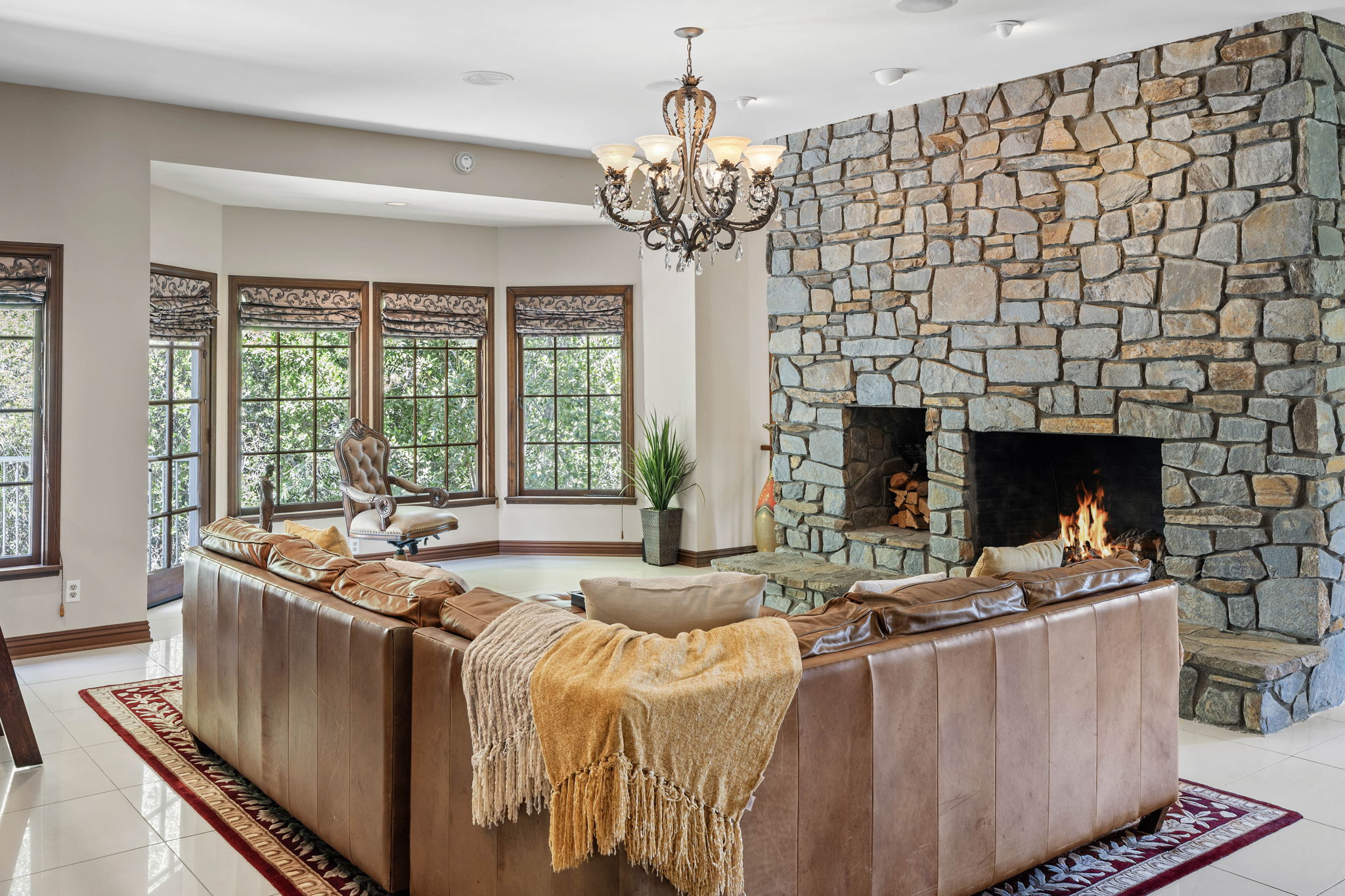 Intimate stone alcove lounge with cozy seating